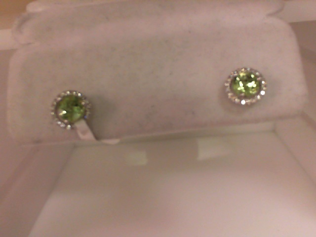 Lady's White 14 Karat Halo Earrings With 0.16Tw Round Diamonds And 2=1.50Tw Round Peridots