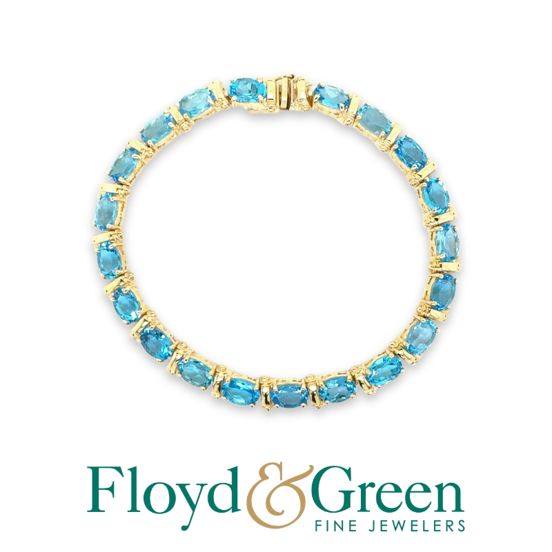 Link 14 Karat Yellow Bracelet
Oval Blue 21.25ct Blue Topazes
7.5 inch