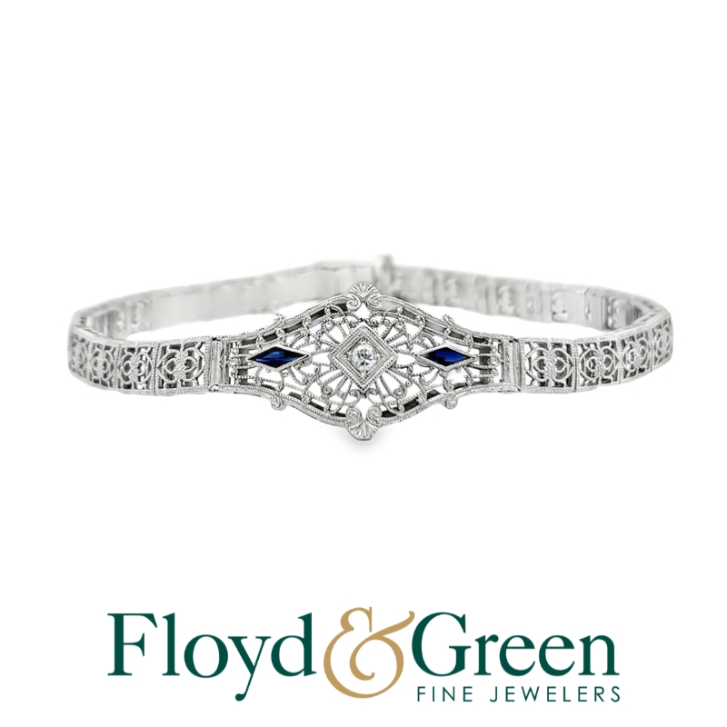 Link Platinum & 14KW Bracelet
Round 0.04ct Diamond H VS1 
2 Blue 0.50ct Sapphires
7 Inch