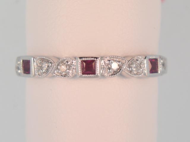 10 KARAT WHITE GOLD STACKABLE RING SIZE 7 WITH 6=0.10TW ROUND I COLOR I1 CLARITY DIAMONDS AND 3=0.12TW PRINCESS RUBYS