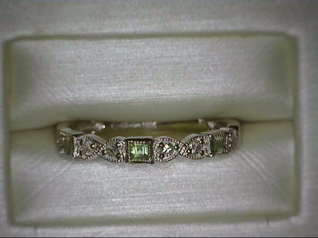 10K WHITE GOLD STACKABLE RING SIZE 7 WITH 3=0.14TW PRINCESS PERIDOTS AND 6=0.10TW ROUND H-I I1 DIAMONDS