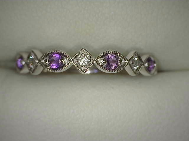 10 KARAT WHITE GOLD STACKABLE RING SIZE 7 WITH 3=0.05TW ROUND I COLOR I1 CLARITY DIAMONDS AND 4=0.16TW ROUND AMETHYSTS
