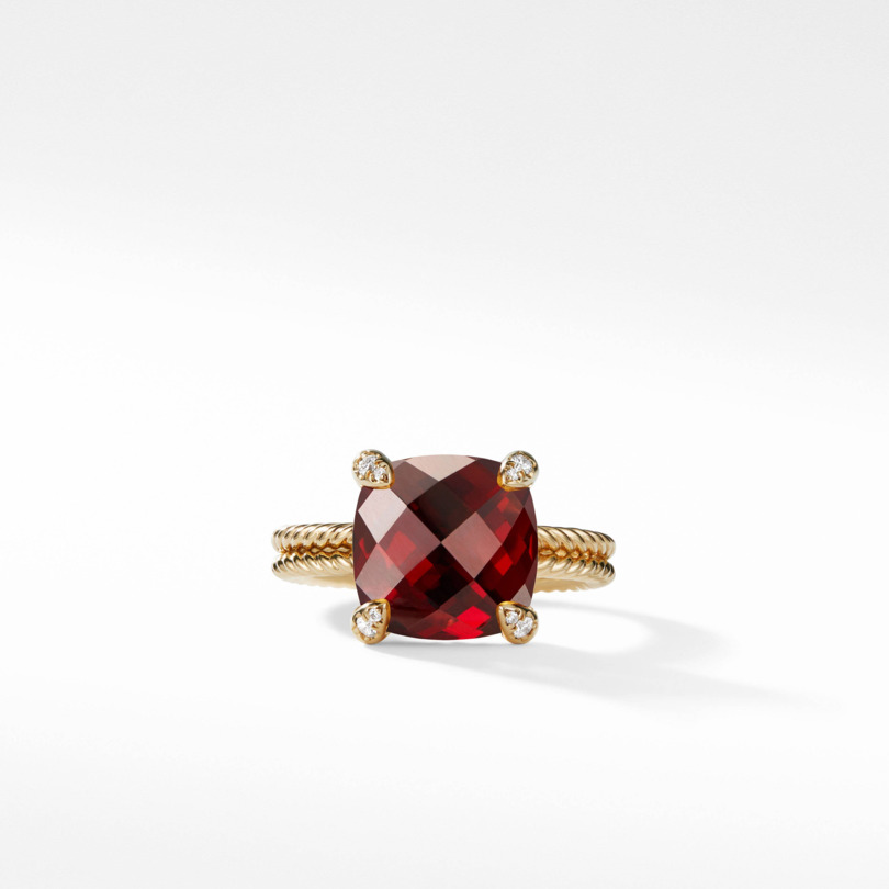 18K YELLOW GOLD RING SIZE 7.5 WITH ONE 11.00MM CUSHION GARNET AND 8=0.05TW ROUND G-H SI2 DIAMONDS