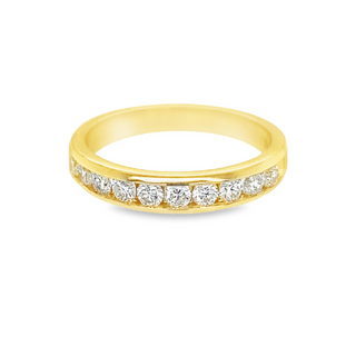 14 KARAT YELLOW GOLD CHANNEL SET DIAMOND ANNIVERSARY RING SIZE 6.5 WITH 11=0.78TW ROUND F-G COLOR SI2 CLARITY DIAMONDS