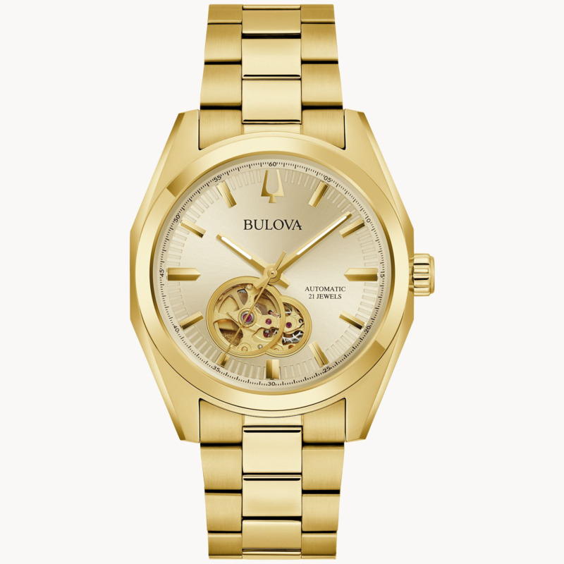GENTS BULOVA SURVEYOR WATCH GOLD TONE STAINLESS STEEL CASE AND BRACELET STRAP WITH CHAMPANGE DIAL