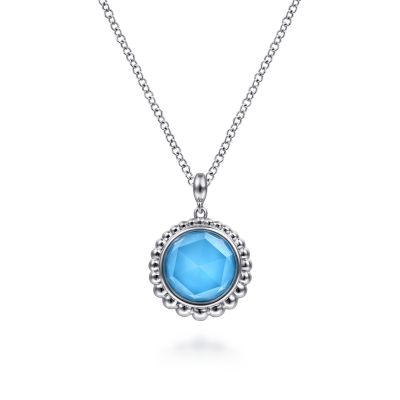 BUJUKAN COLLECTION STERLING SILVER BEADED HALO PENDANT WITH ONE 8.00MM ROUND ROCK CRYSTAL & SIMULATED TURQUOISE 17.5