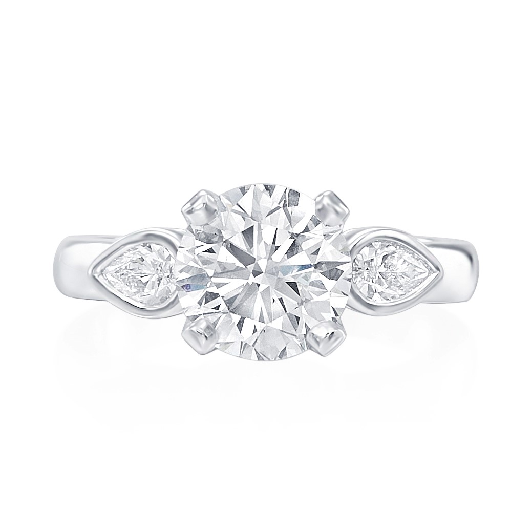 Korman Signature Platinum Round Diamond With Bezel Set Pear Side Stones Engagement Ring