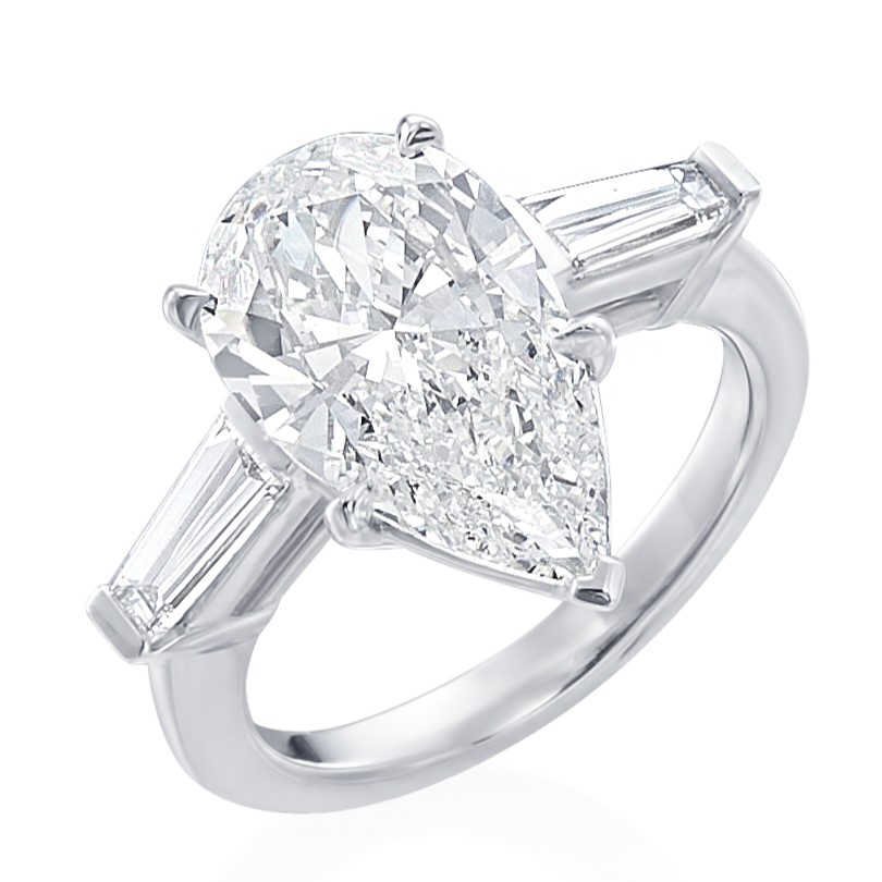 Korman Signature Platinum Pear Shaped Diamond Center Stone with  Tapered Baguette Side Stones Engagement Ring