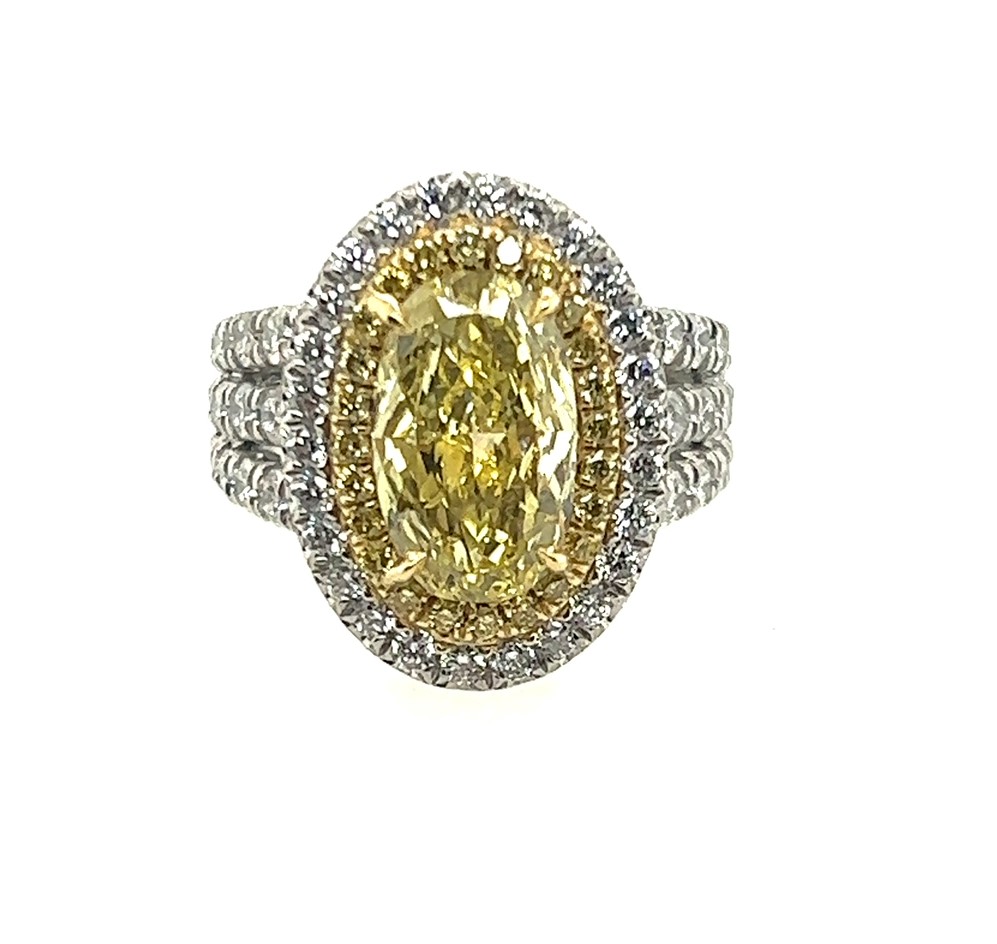 Korman Signature Platinum Oval Yellow Diamond Halo Engagement Ring