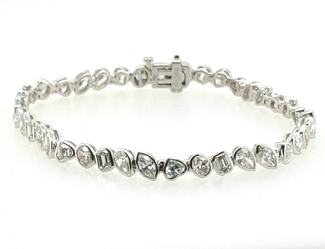 18k Wg 1.50ctw 8 Ov / 1.72ctw 9 Ec / 1.61ctw 8 Ps / 1.39ctw 7 Mq / 1.14ctw 7 Hs Gh Vs2-si1 Diamond Bezel Set Tennis Bracelet 7