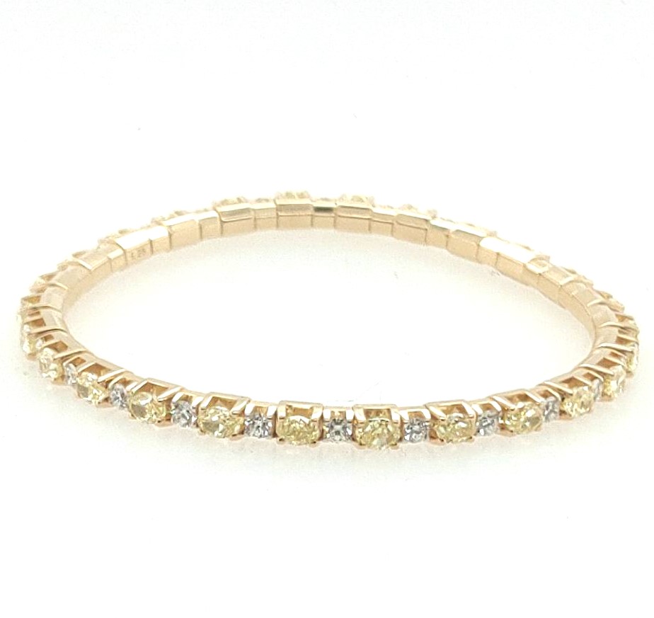18k Yellow Gold 7.11ctw Fancy Yellow Oval Diamond / White Round Fg Vs2 Si1 Diamond Stretch Tennis Bracelet