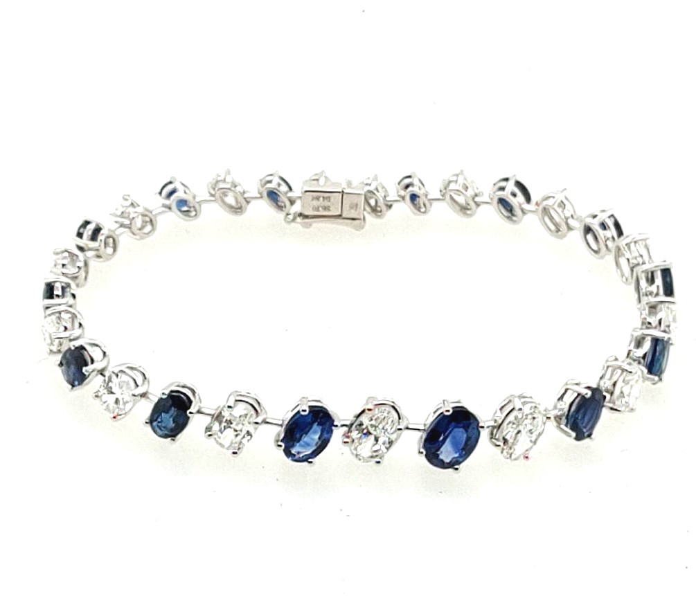 18k White Gold 3.70ctw 14 Oval Blue Sapphire / 4.84ctw 15 Oval Diamond 4 Prong Tennis Bracelet 7