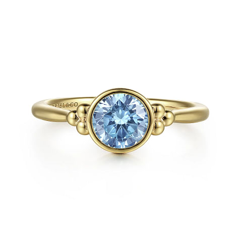G&c .88bttw 14kt Yg Bezel Set Blue Topaz Fashion Ring With Bujukan Bead Accent Serial #s2018380
