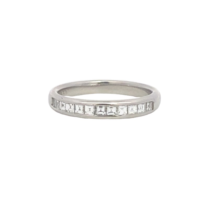 Platinum Diamond Wedding Band Having 12 Princess Cut Diamonds  Channel Set In Center