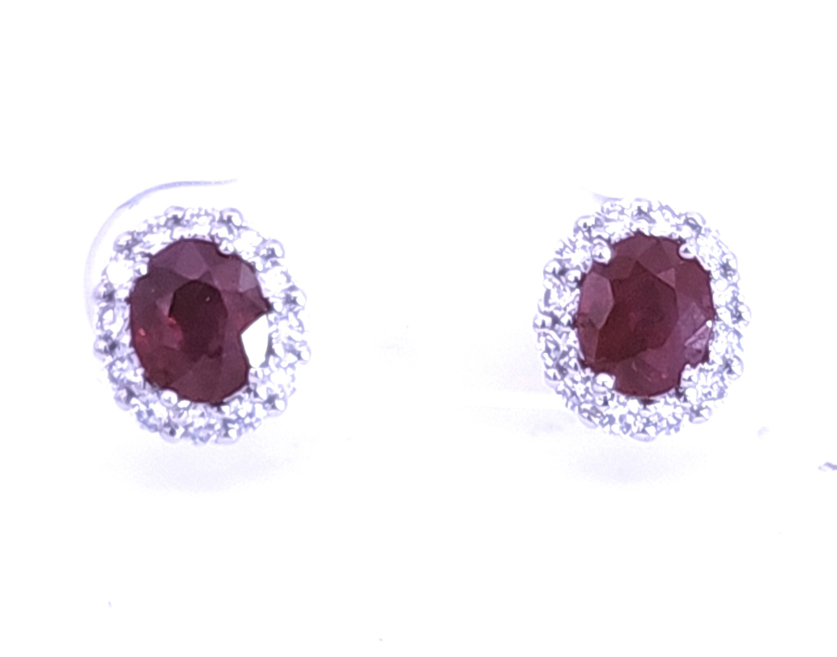 18 Karat White Gold Ruby And Diamond Halo Stud Earrings