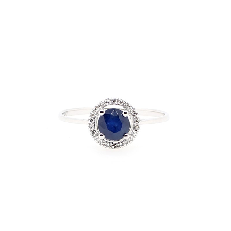 14 Karat White Gold Round Cut Blue Sapphire .52 carat Prong Set In The Center Surrounded By 24 full cut Diamonds .07 carats I1 H-I Prong Set in A Halo Design.