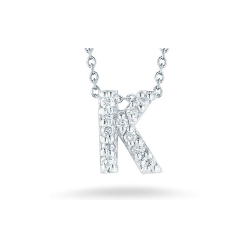 Roberto Coin 18k white gold diamond "K" love letter necklace suspended on an eighteen karat white gold oval link chain measuring 18 inches adjustable to 16 inches
