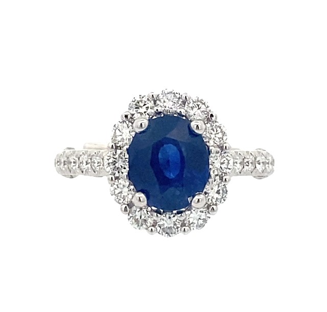 18 Karat White Gold Blue Sapphire And Diamond Halo Ring