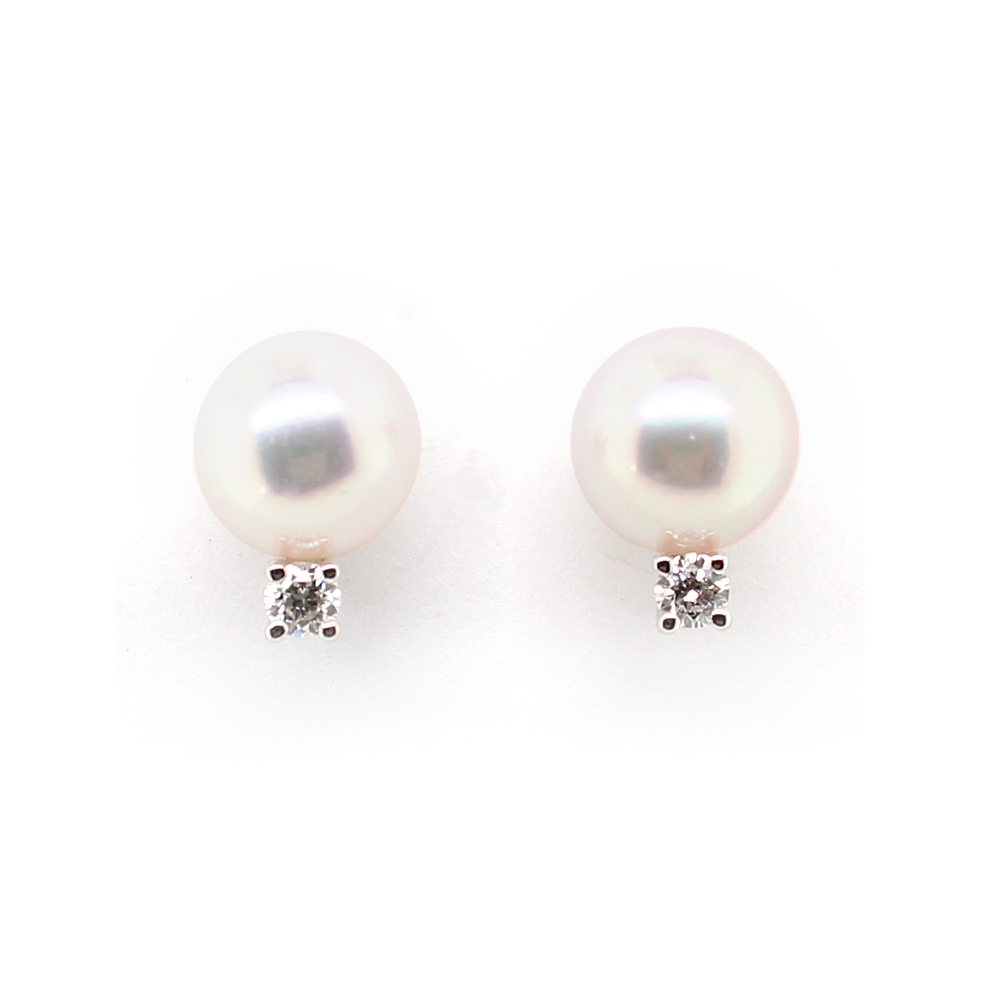 Mikimoto 18 karat white gold pearl stud and diamond earrings- each earring has 1 7-7.5mm "AA" quality pearl and 1 full cut