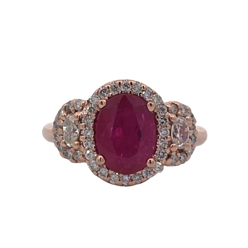 Oval Ruby And Diamond 3 Stone Halo Ring