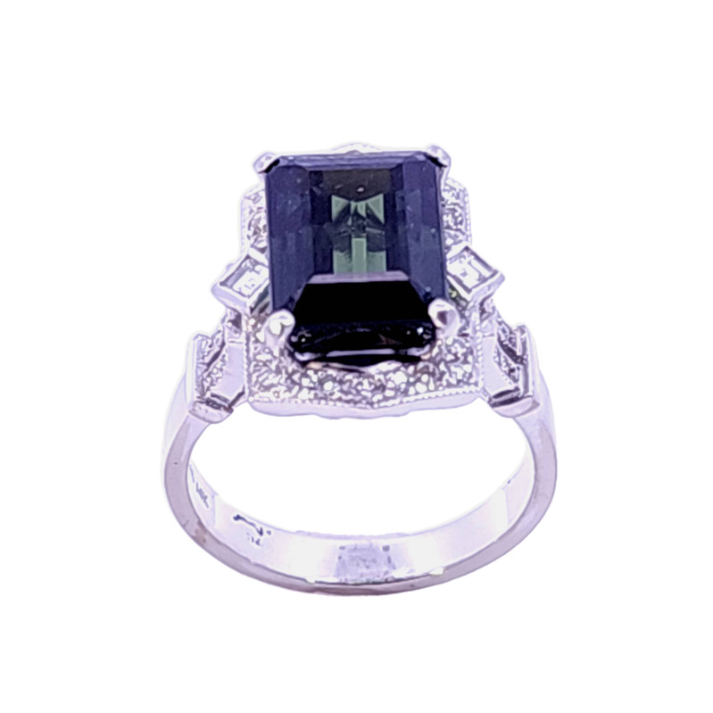 Estate 14 Karat White Gold Tourmaline And Diamond Ring   Four Prong Set In The Center Is 1 Emerald Cut Tourmaline Measuring 10.84 X 8.34 Mm Approximately 5.0 Carats
