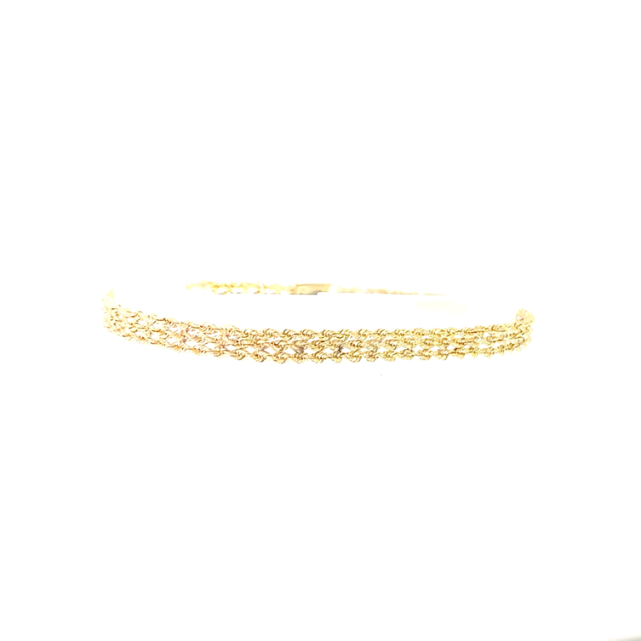 Estate 14 Karat Yellow Gold 3 Row Rope Bracelet Measuring 7 Inches And Having A Tongue And Groove Clasp