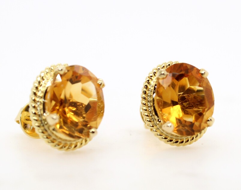 Each Earring Contains 1 Oval Faceted Citrine Measuring 11 X 9 mm Prong Set In A Rope Edge Frame. The Earrings Have Post And Friction Backs. The 2 Citrines Have A Total Weight Of Approximately 7.0 Carats. 3.