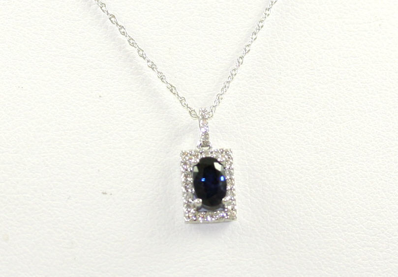 14 Karat White Gold Sapphire And Diamond Pendant