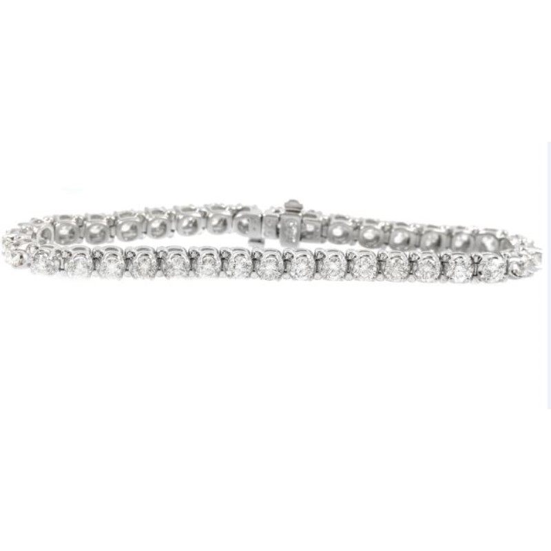 18 Karat White Gold  Diamond Tennis Bracelet Measuring 7" Long