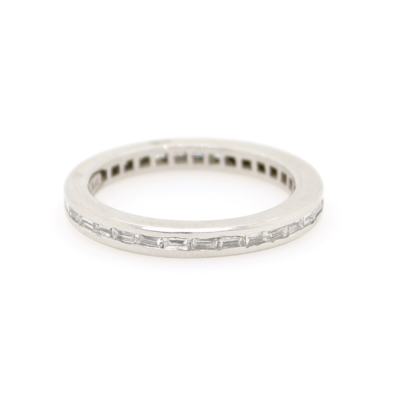 Estate Platinum Diamond Eternity Band Having 30 Baguette Diamonds Channel Set  Eternally  With An Approximate Total Weight Of .75 Carat And Graded VS1 For Clarity And H For Color