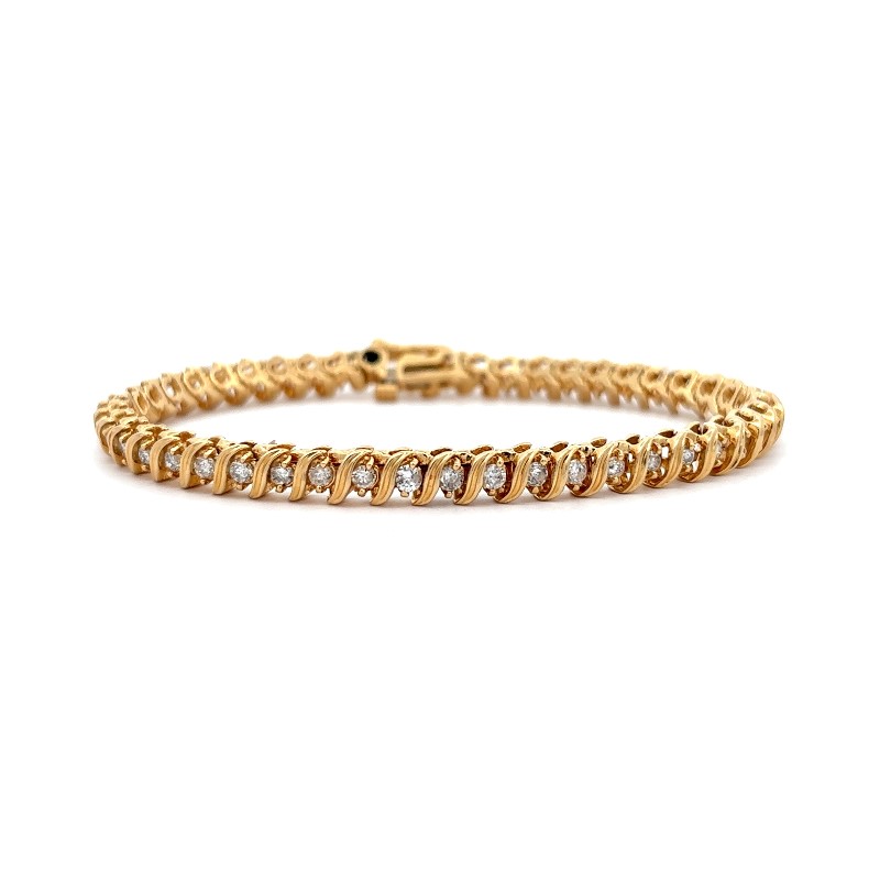 Estate 14 Karat Yellow Gold "S" Link Diamond Tennis Bracelet Having 47 Full Cut Diamonds Having An Approximate Weight Of 3.29 Carats And Graded I1 For Clarity And I-J For Color