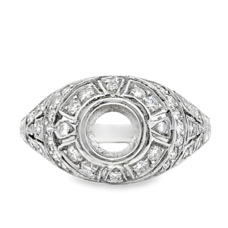 Platinum Diamond Bezel Semi Mount Ring  The ring contains a dome shape with a round bezel set head surrounded by 36 full cut diamonds with a combined weight of 0.29 carat and graded H for color and VS2 for clarity  prong set
