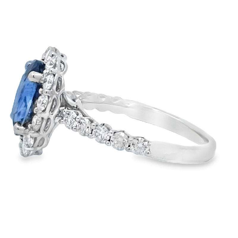 Oval Blue Sapphire And Diamond Halo Ring