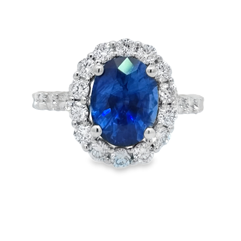Oval Blue Sapphire And Diamond Halo Ring