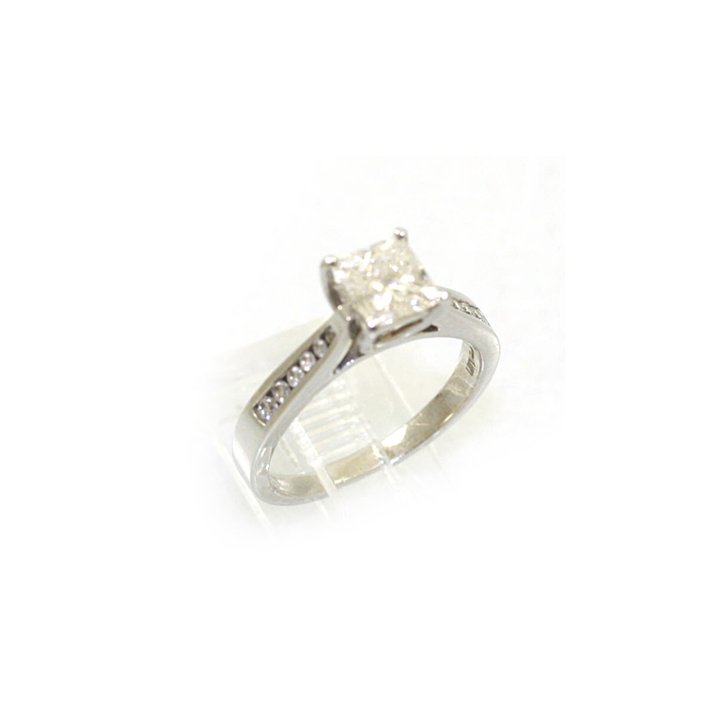 18 Karat White Gold Princess Cut And Full Cut Diamond Ring