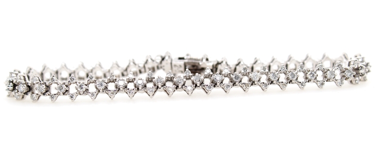 Estate 14 karat white gold diamond link bracelet measuring 7" long