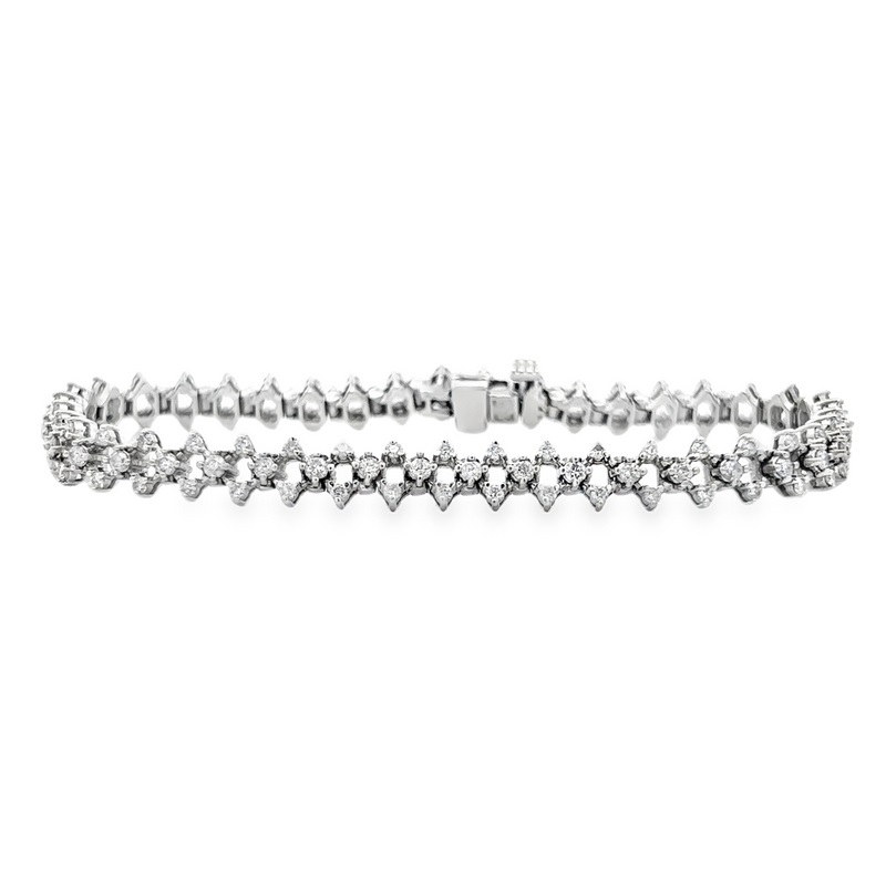 Estate 14 karat white gold diamond link bracelet measuring 7" long