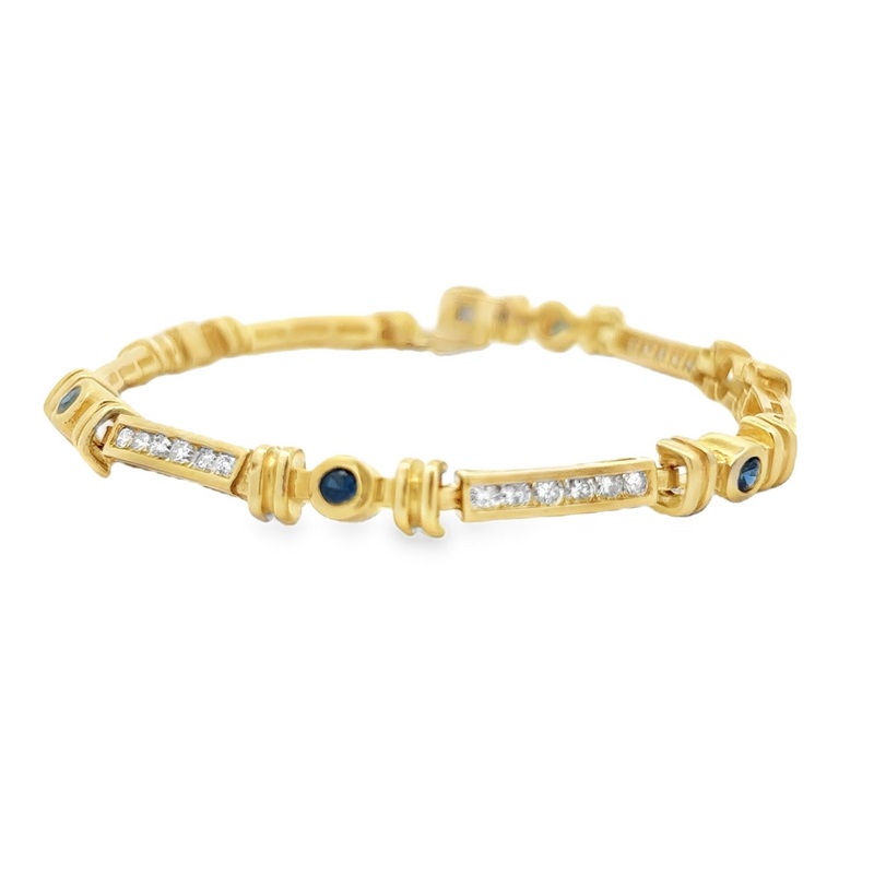 Estate 14 Karat Yellow Gold Diamond And Blue Sapphire Bracelet Measuring 7"