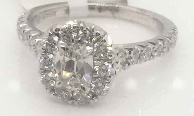 Henri Daussi lady's 18 karat white gold cushion & 24 full cut diamond halo ring