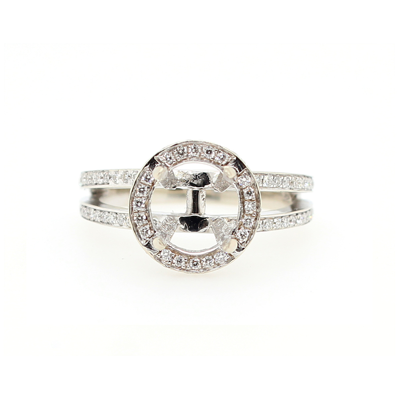 Lady's 18 karat white gold diamond semi mount ring
