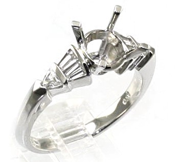 Platinum Semi Mount Ring Having A 4 Prong Center For A Round Stone