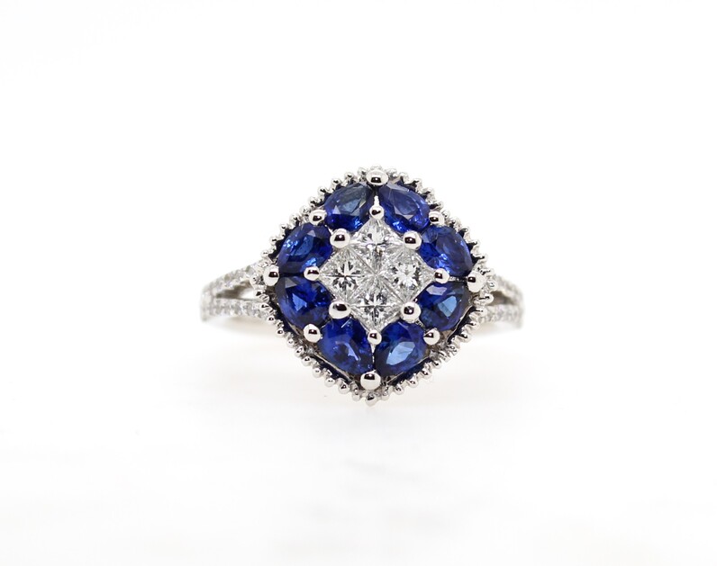 18 Karat White Gold  Diamond And Blue Sapphire Ring