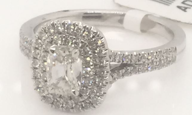 Henri Daussi lady's 18 karat white gold cushion and full cut diamond halo ring