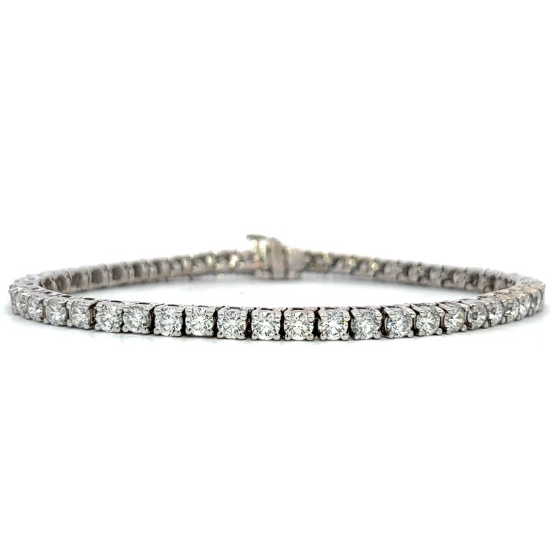 18 Karat White Gold Diamond Tennis Bracelet In The 7 Carat Category Having Full Cut Diamonds In 4-Prong Settings