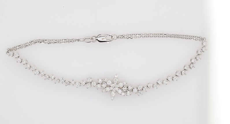 14 Karat White Gold Diamond Flower Bracelet Measuring 7 Inches