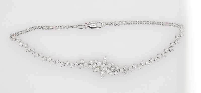 14 Karat White Gold Diamond Flower Bracelet Measuring 7 Inches