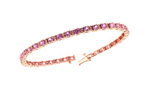 14 Karat Rose Gold Diamond And Pink Sapphire Bracelet Measuring 7" Long