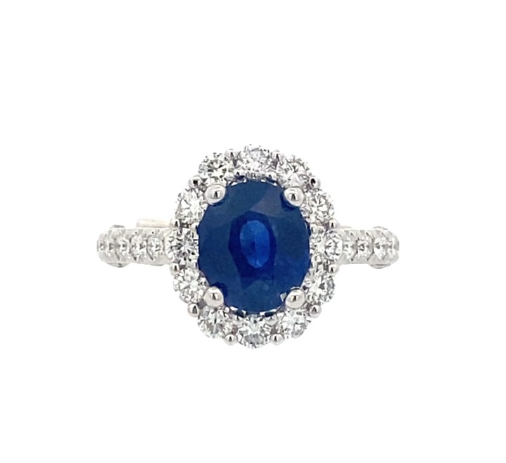 18 Karat White Gold Blue Sapphire And Diamond Halo Ring