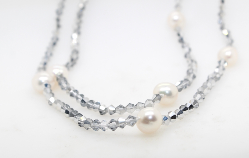 Hematite Necklace With 12 White Pearl Stations
