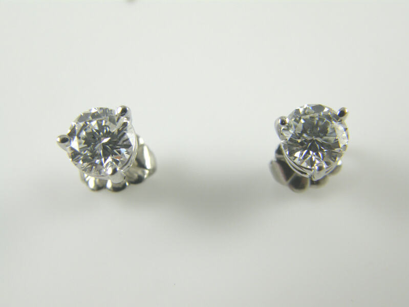 Grosbard  Plat Dia Solitaire Earrings  Each Having 1 Rb In A 4-Prong Basket Style Setting